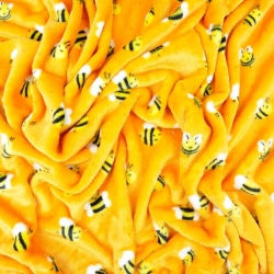 Kuschelfleece Stoff – Kinder Muster - Bienen auf orangefarbenem Hintergrund