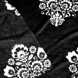 Kuschelfleece Stoff – Kinder Muster - mit Łowicz-Muster in Weiß auf schwarzem Hintergrund